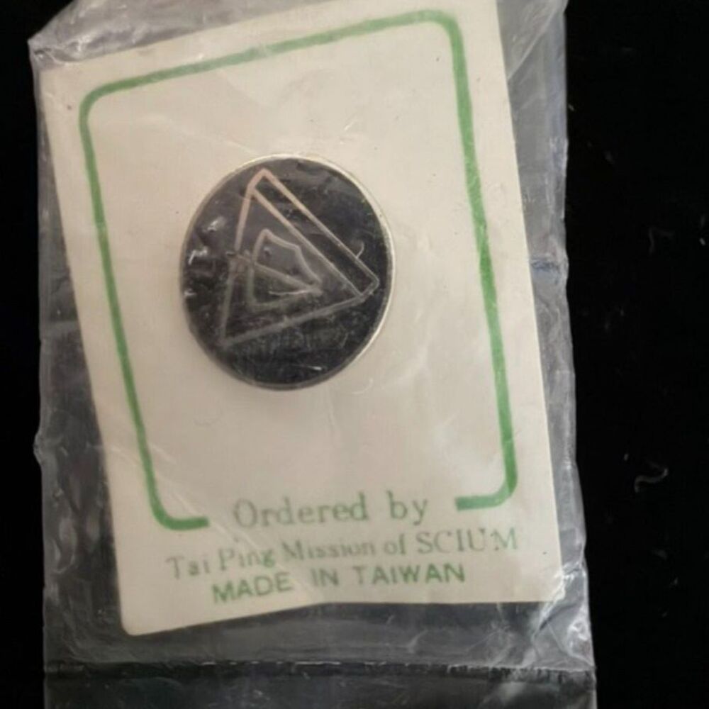 Tai Ping Mission of SCIUM triangle logo lapel pin in original packaging